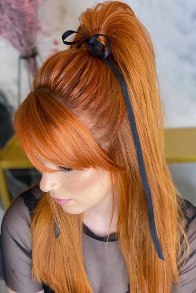 Messy Ponytail With A Cute Bow