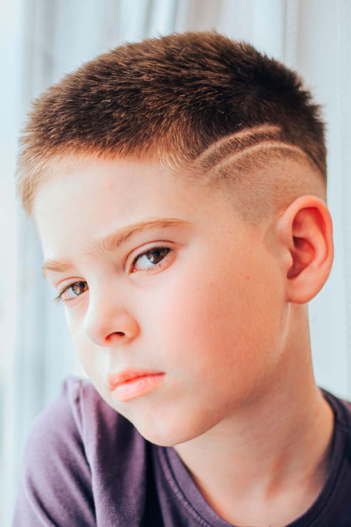 Fade Cut For Thick Hair With Shaved-Side Patterns