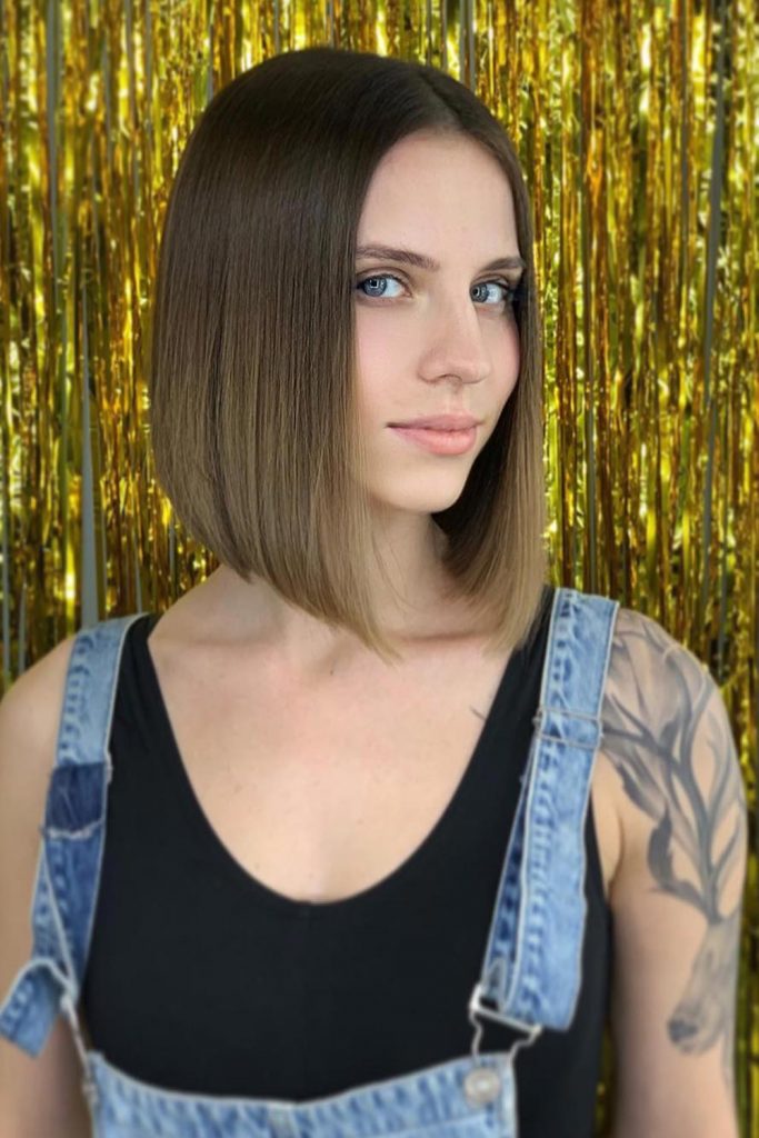 A middle-parted lob is what appears in women&rsquo;s minds when they think of classic haircuts for women