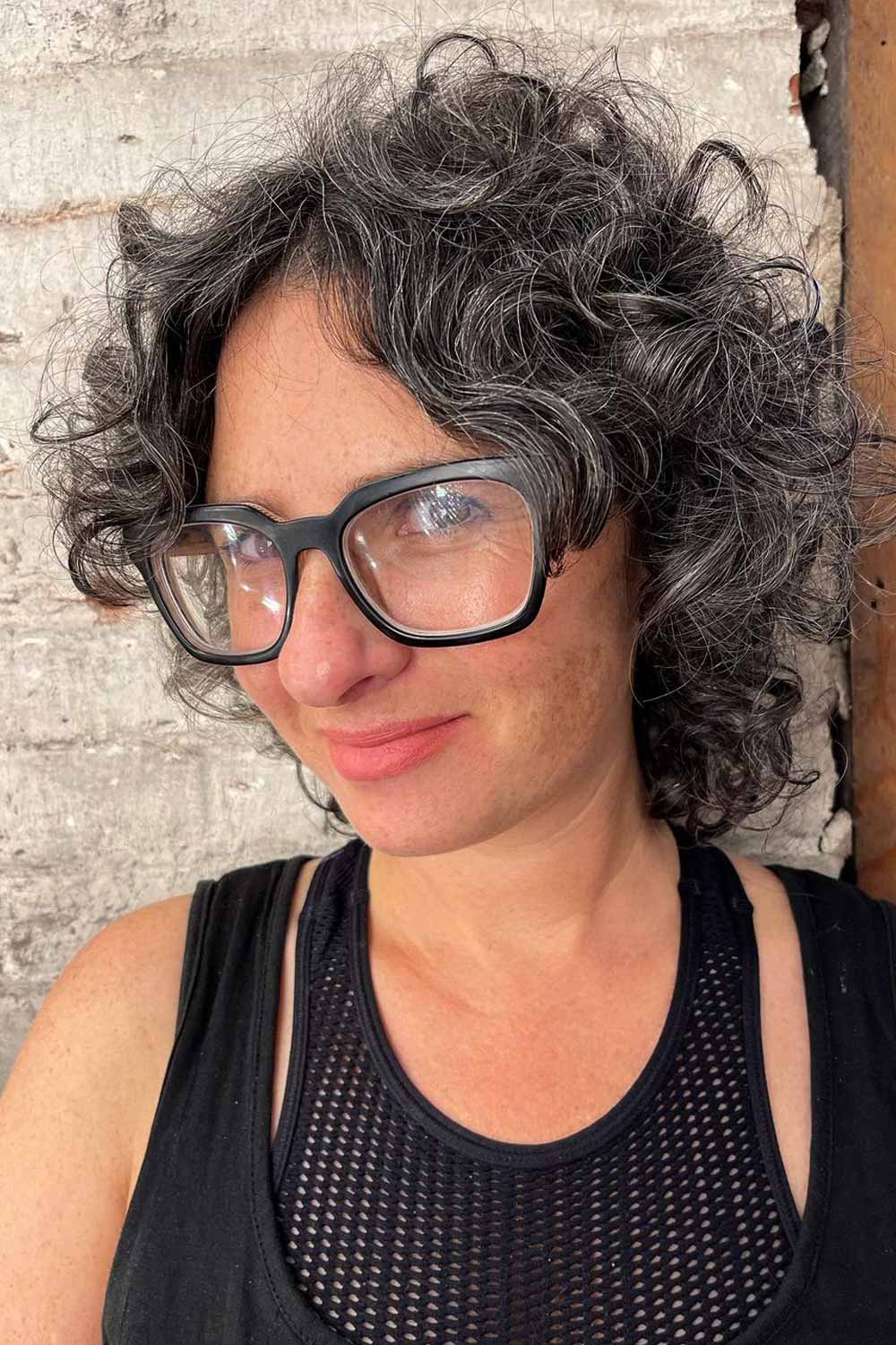Short Curly Hair with Curtain Bangs