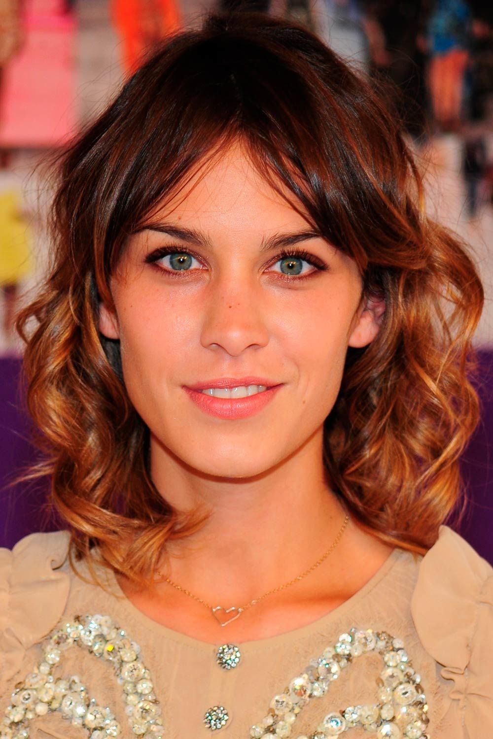 Curly Hairstyle With Curtain Bang