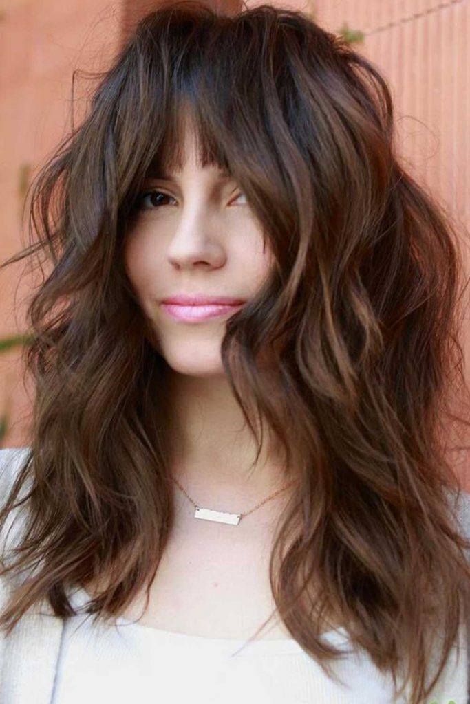 Medium Hair With Center Parted Bangs