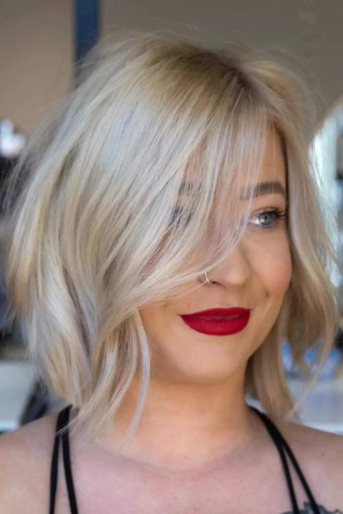 Flirty, Flipped Frock Hairstyles For Round Faces 