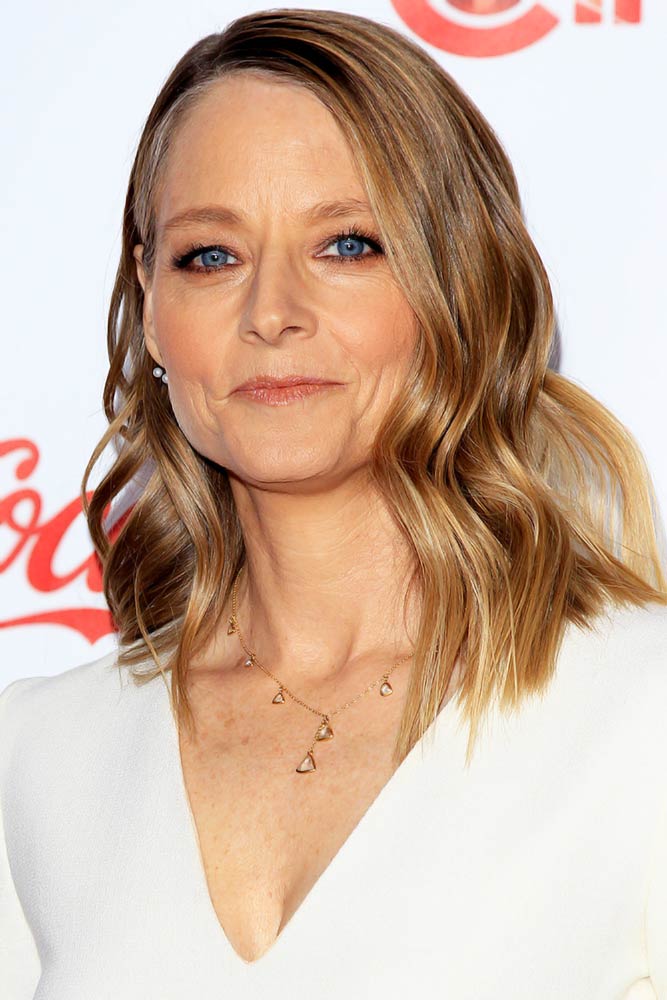 Deep Side Parted Style With Soft Waves #hairstylesforwomenover50