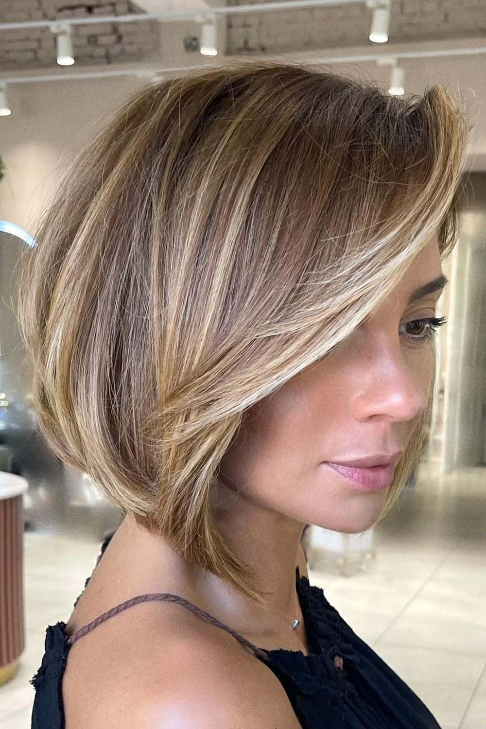 Dark Blonde Asymmetrical Bob Hairstyle