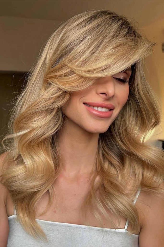 Pretty Wavy Hairstyle With Long Side Bang