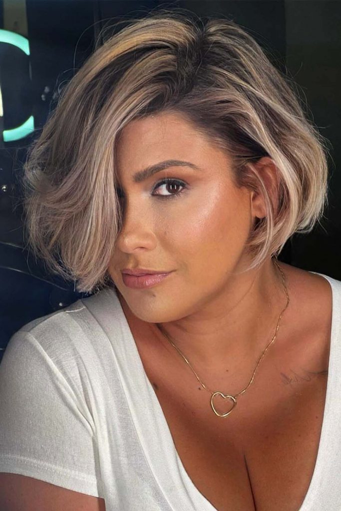 Layered Blonde Bob With Dark Roots